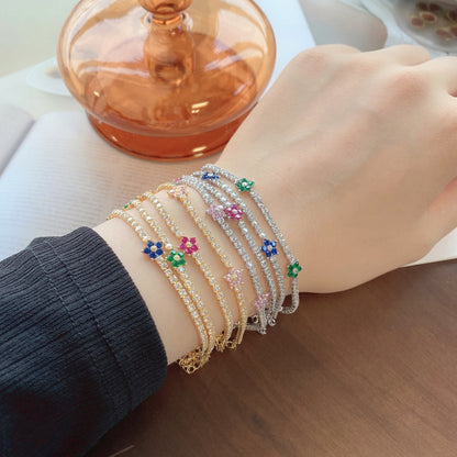 [Elitejewels]輝く花の形のテニスブレスレット