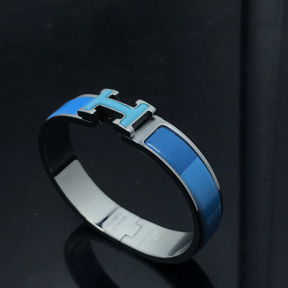 [Elitejewels]H ARMBAND BLAU REGENBOGEN KERAMIK