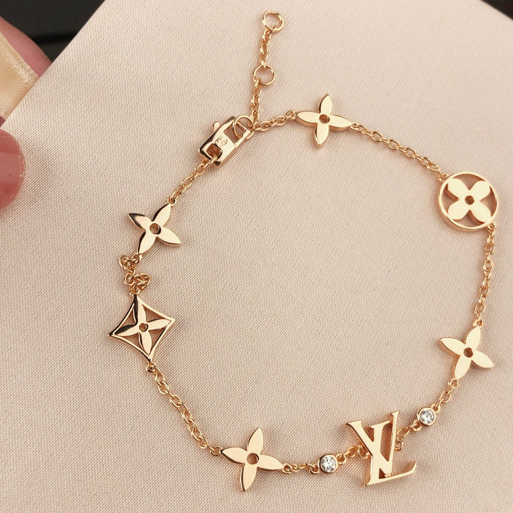 [Elitejewels]STAR AND SUN 7 MOTIFS GOLD BRACELET