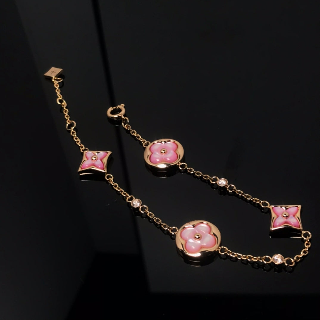 [Elitejewels]STAR AND SUN 4 MOTIF PINK MOP PINK GOLD BRACELET