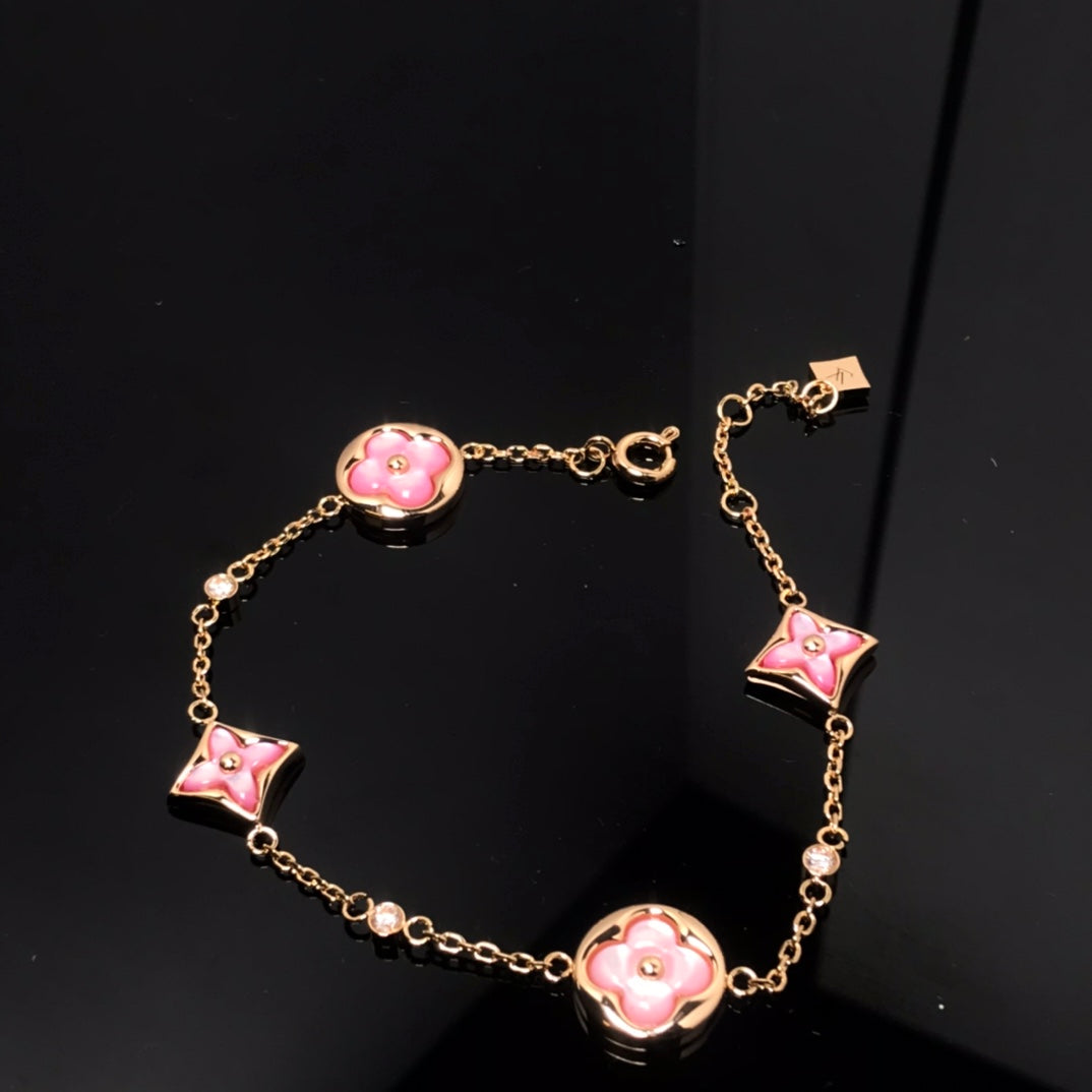 [Elitejewels]STAR AND SUN 4 MOTIF PINK MOP PINK GOLD BRACELET