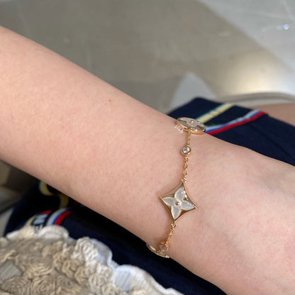 [Elitejewels]STAR AND SUN 4 MOTIF WHITE MOP PINK GOLD BRACELET